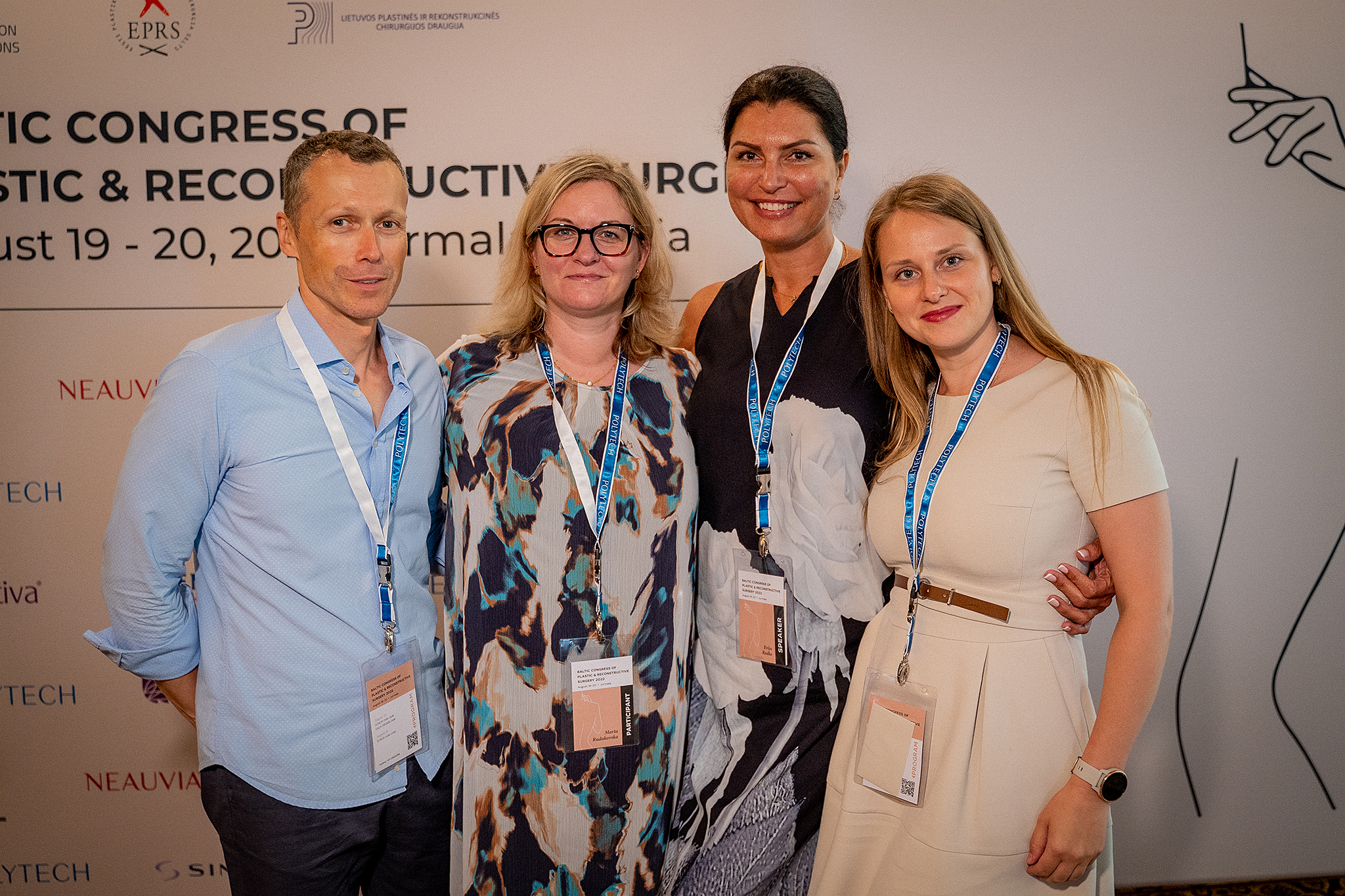 Image shows a picture of four plastic surgeons